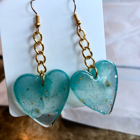 Beautiful blue hearts with gold and larger chain. Medium size.